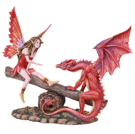 11" Fairy Statue - Playing with Red Dragon on Seesaw - Magick Magick.com