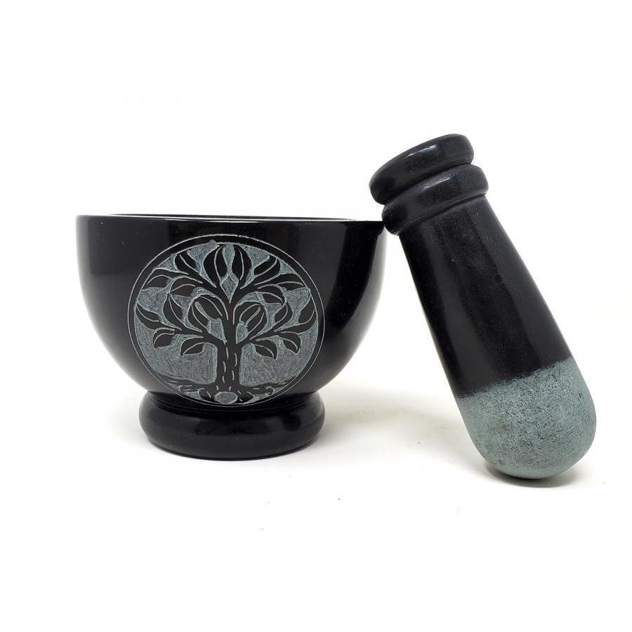 http://magick.com/cdn/shop/products/3-x-4-Tree-of-Life-Carved-Black-Soapstone-Mortar-Pestle_faea8f9f-ceeb-4115-b40a-ae332034f11d.jpg?v=1647518780