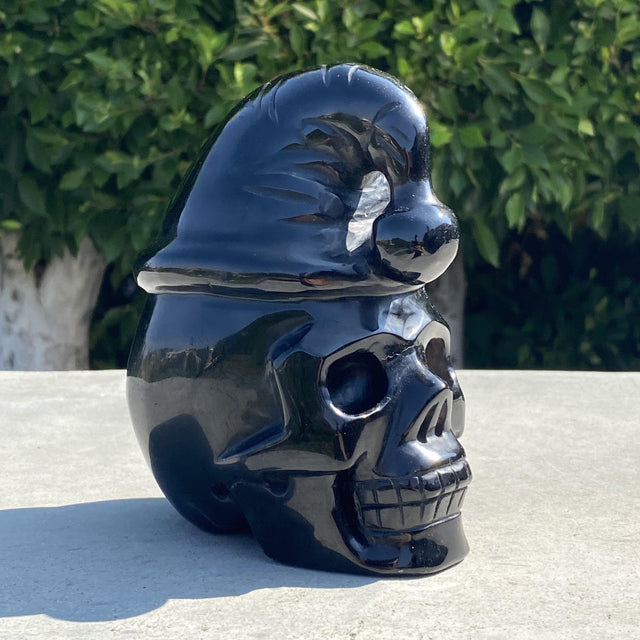 Natural Black Obsidian Hand Carved Skull with Santa Hat Front - 3.68 lbs (4.5 x 3 x 6 inches) - Magick Magick.com