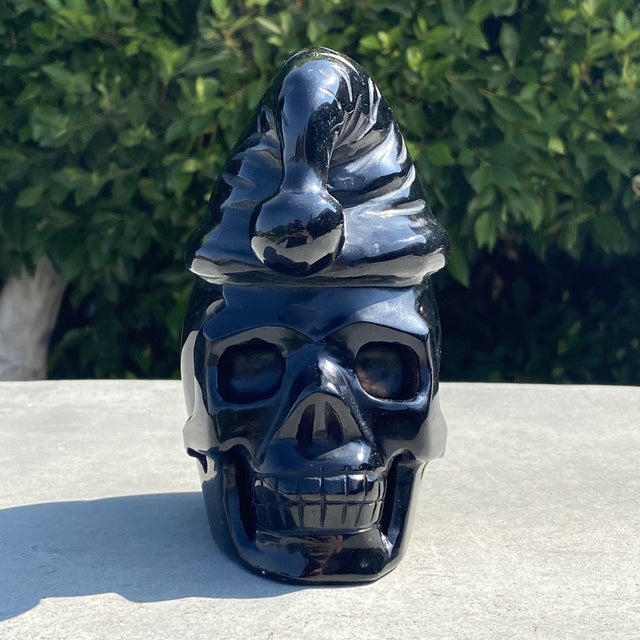 Natural Black Obsidian Hand Carved Skull with Santa Hat Front - 3.68 lbs (4.5 x 3 x 6 inches) - Magick Magick.com