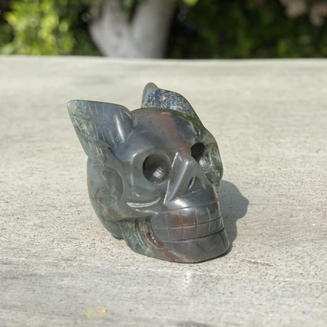 Natural Bloodstone Hand Carved Small Skull with Wings - .24 lbs (2 x 1.25 x 1.75 inches) - Magick Magick.com