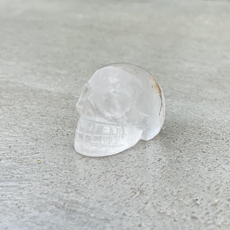 Natural Clear Quartz Hand Carved Small Skull - .08 lbs (1.5 x 1 x 1 inches) - Magick Magick.com