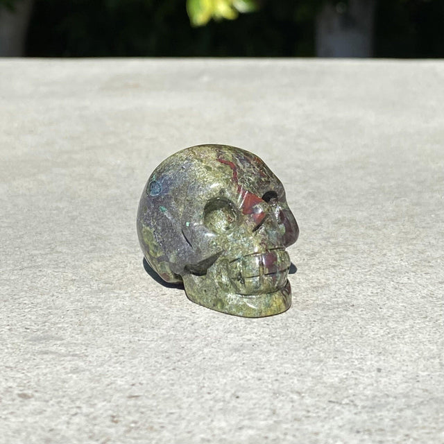 Natural Dragon Blood Jasper Hand Carved Small Skull - .10 lbs (1.5 x 1 x 1 inches) - Magick Magick.com