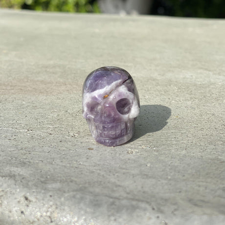 Natural Dream Amethyst Hand Carved Small Skull A - .08 lbs (1.5 x 1 x 1 inches) - Magick Magick.com