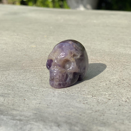 Natural Dream Amethyst Hand Carved Small Skull B - .08 lbs (1.5 x 1 x 1 inches) - Magick Magick.com