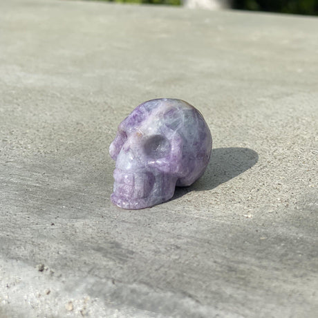 Natural Dream Amethyst Hand Carved Small Skull C - .08 lbs (1.5 x 1 x 1 inches) - Magick Magick.com