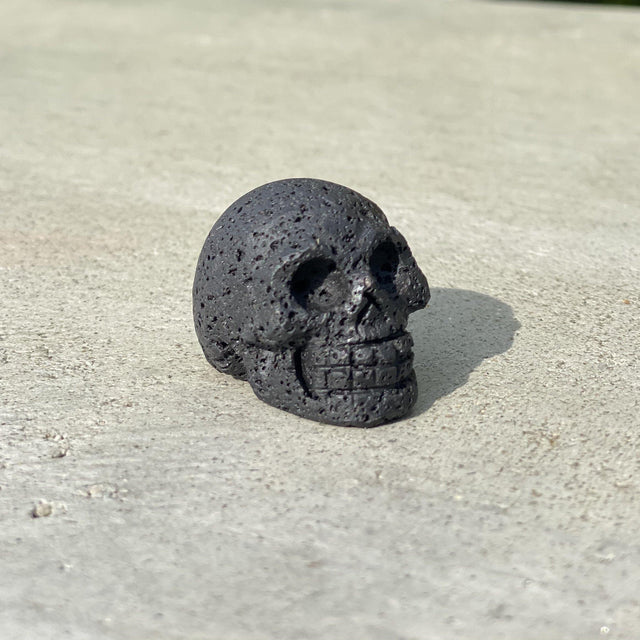 Natural Lava Hand Carved Small Skull - .08 lbs (1.5 x 1 x 1 inches) - Magick Magick.com