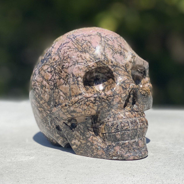 Natural Rhodonite Hand Carved Skull - 3.10 lbs (4 x 3.5 x 3.5 inch) - Magick Magick.com