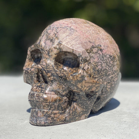 Natural Rhodonite Hand Carved Skull - 3.10 lbs (4 x 3.5 x 3.5 inch) - Magick Magick.com
