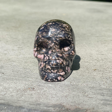 Natural Rhodonite Hand Carved Small Skull D - .24 lbs (2 x 1.25 x 1.5 inches) - Magick Magick.com
