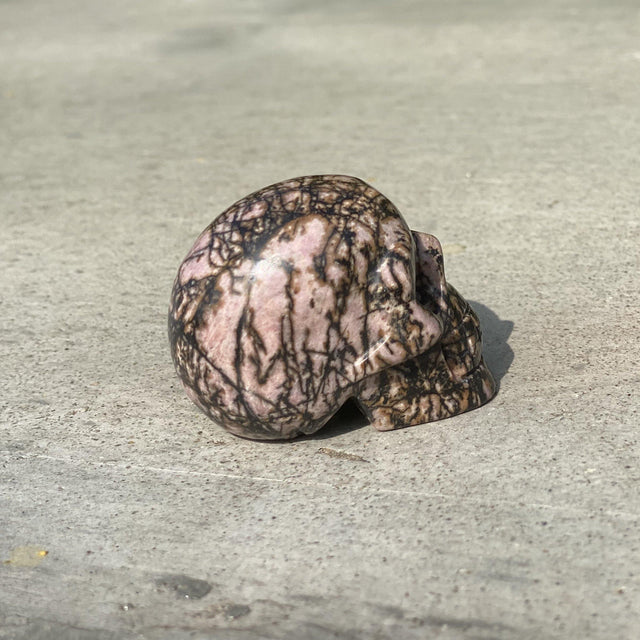 Natural Rhodonite Hand Carved Small Skull - .26 lbs (2 x 1 x 1.5 inches) - Magick Magick.com