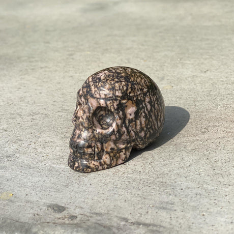 Natural Rhodonite Hand Carved Small Skull - .26 lbs (2 x 1 x 1.5 inches) - Magick Magick.com