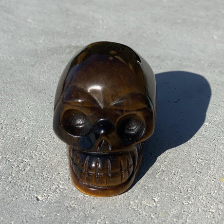 Natural Tiger's Eye Hand Carved Small Skull - .20 lbs (2 x 1.5 x 1.5 inch) - Magick Magick.com