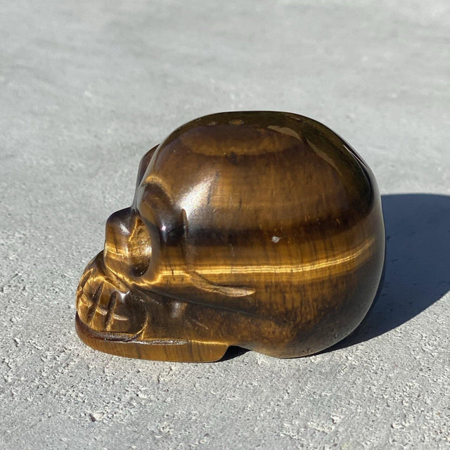 Natural Tiger's Eye Hand Carved Small Skull - .20 lbs (2 x 1.5 x 1.5 inch) - Magick Magick.com