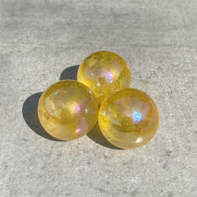 Natural Yellow Aura Quartz Mini Sphere Set 27 - .12 lbs (Approx 1 inch) - Magick Magick.com