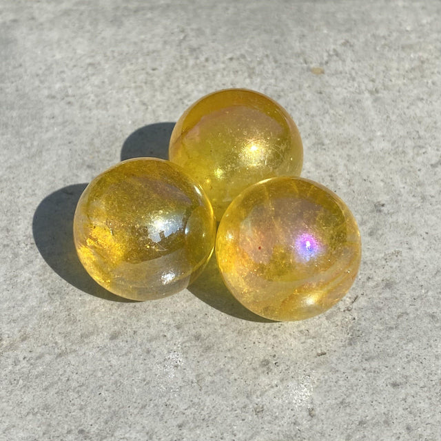 Natural Yellow Aura Quartz Mini Sphere Set 32 - .12 lbs (Approx 1 inch) - Magick Magick.com